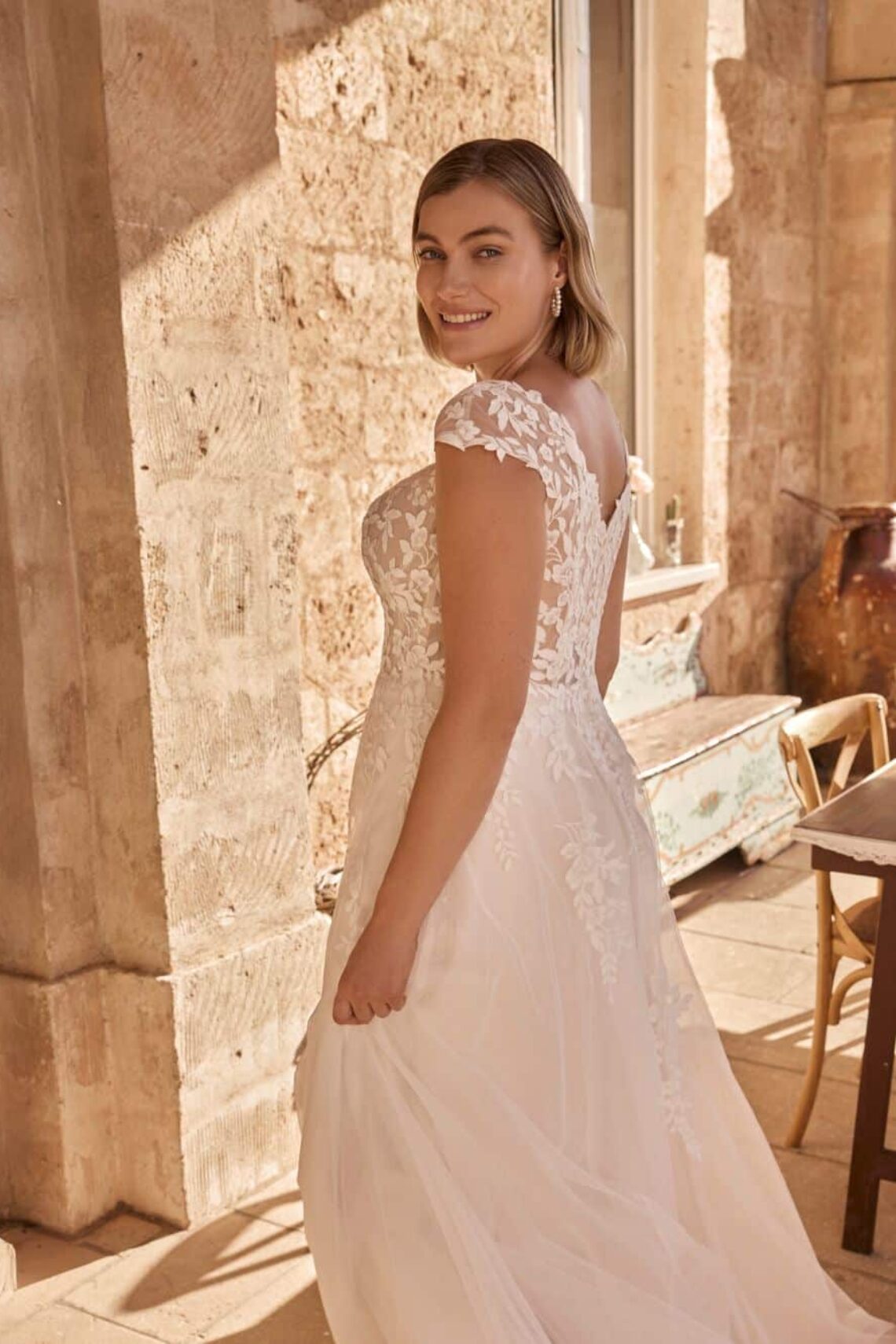 close-up-back-plus-size-wedding-dress-nova-by-modeca-silhouette